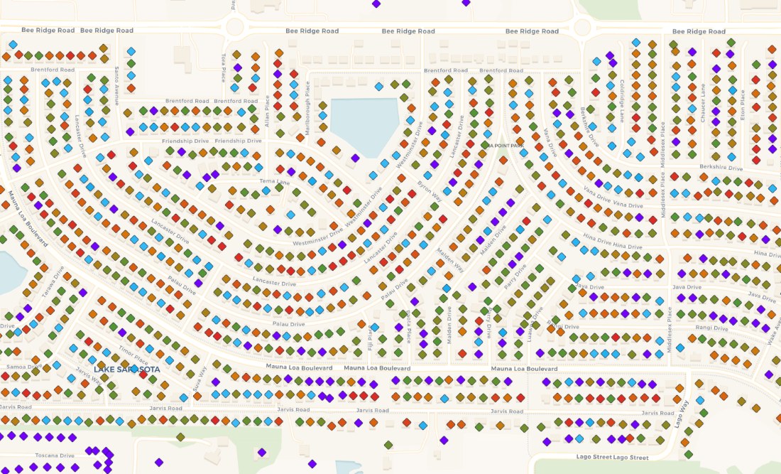 RoofHound map view of a Sarasota neighborhood, every property marked with a diamond color-coded by roof age